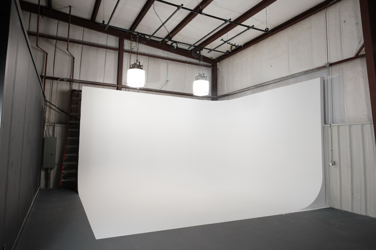All white pre-lit cyc wall measuring at 12’x20’x17′